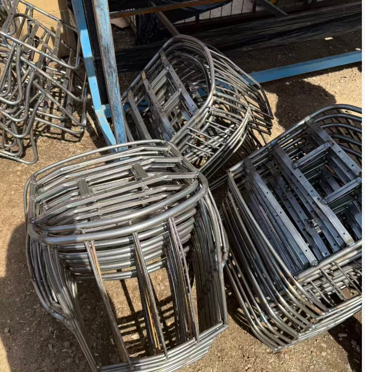 Finished painted metal chair frames after SZGH welding robot deployment, Russia.jpg