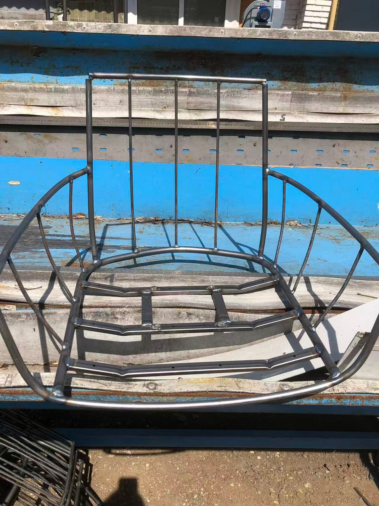 Steel tube chair frame structures awaiting welding &mdash; SZGH welding robot application.jpg