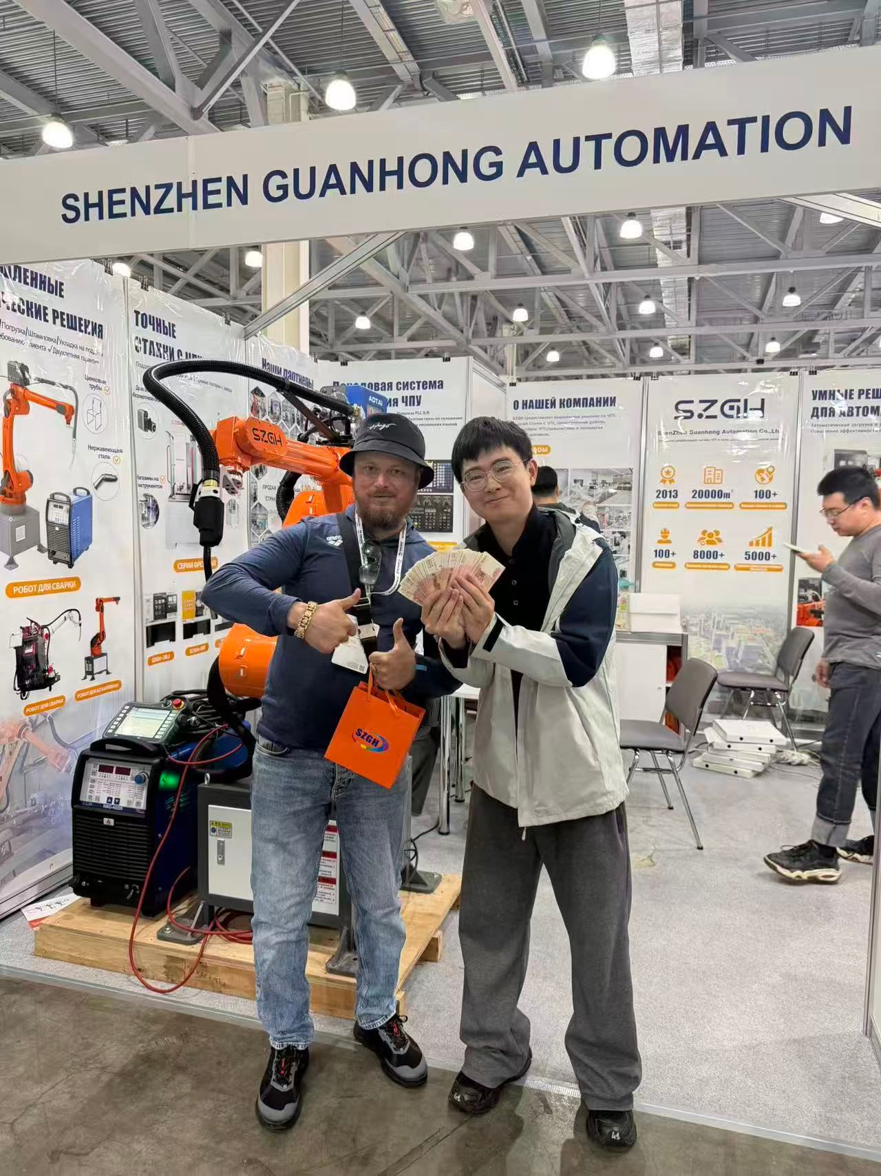 SZGH (Shenzhen Guanhong Automation) exhibition booth &mdash; where Russian customer first encountered SZGH robots.jpg